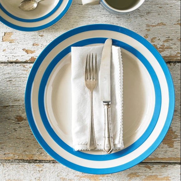 Set table with blue-rimmed plates, Cornishware
